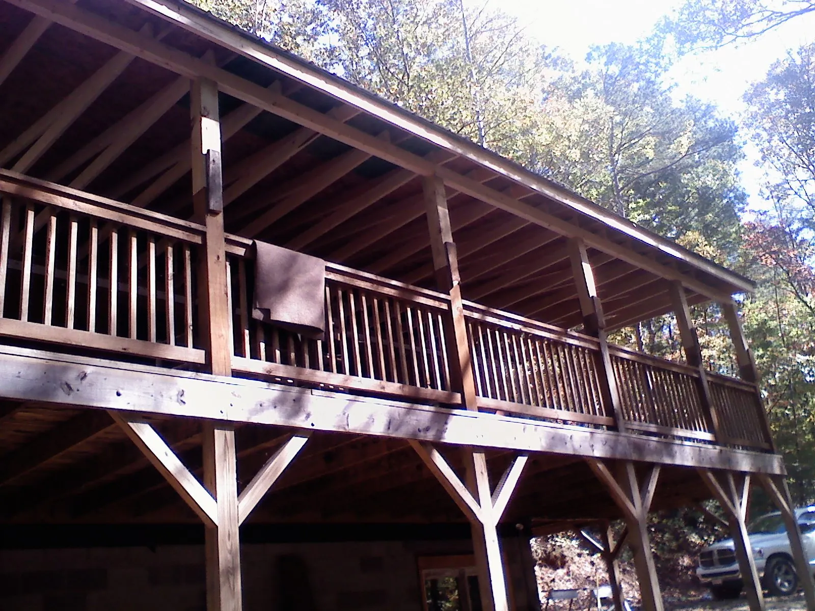 Timber framing under a new elevated porch and deck — Roof Leak Repair in Saint Paul Park by Roofing Brothers